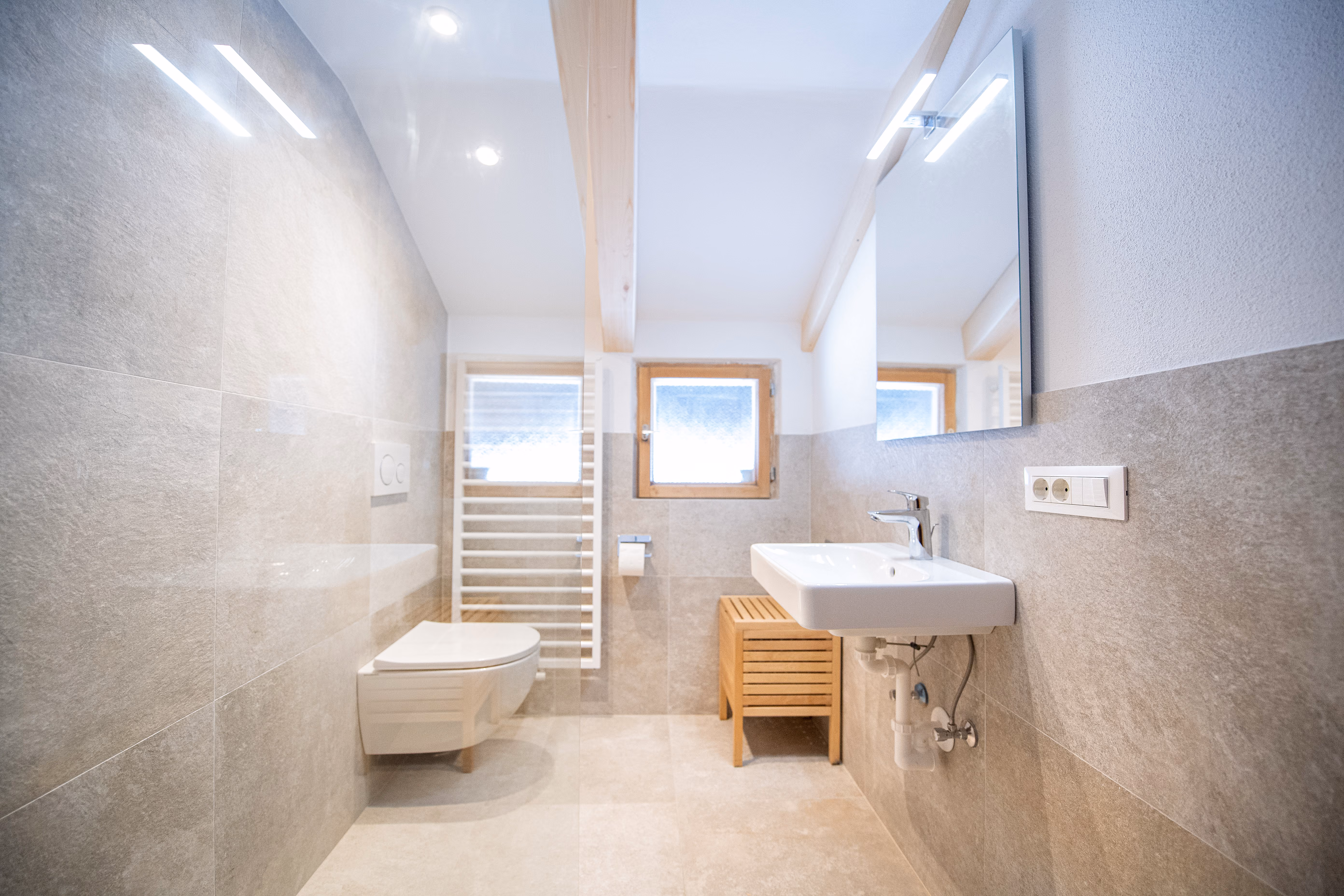 The bathroom, rain shower under the beam